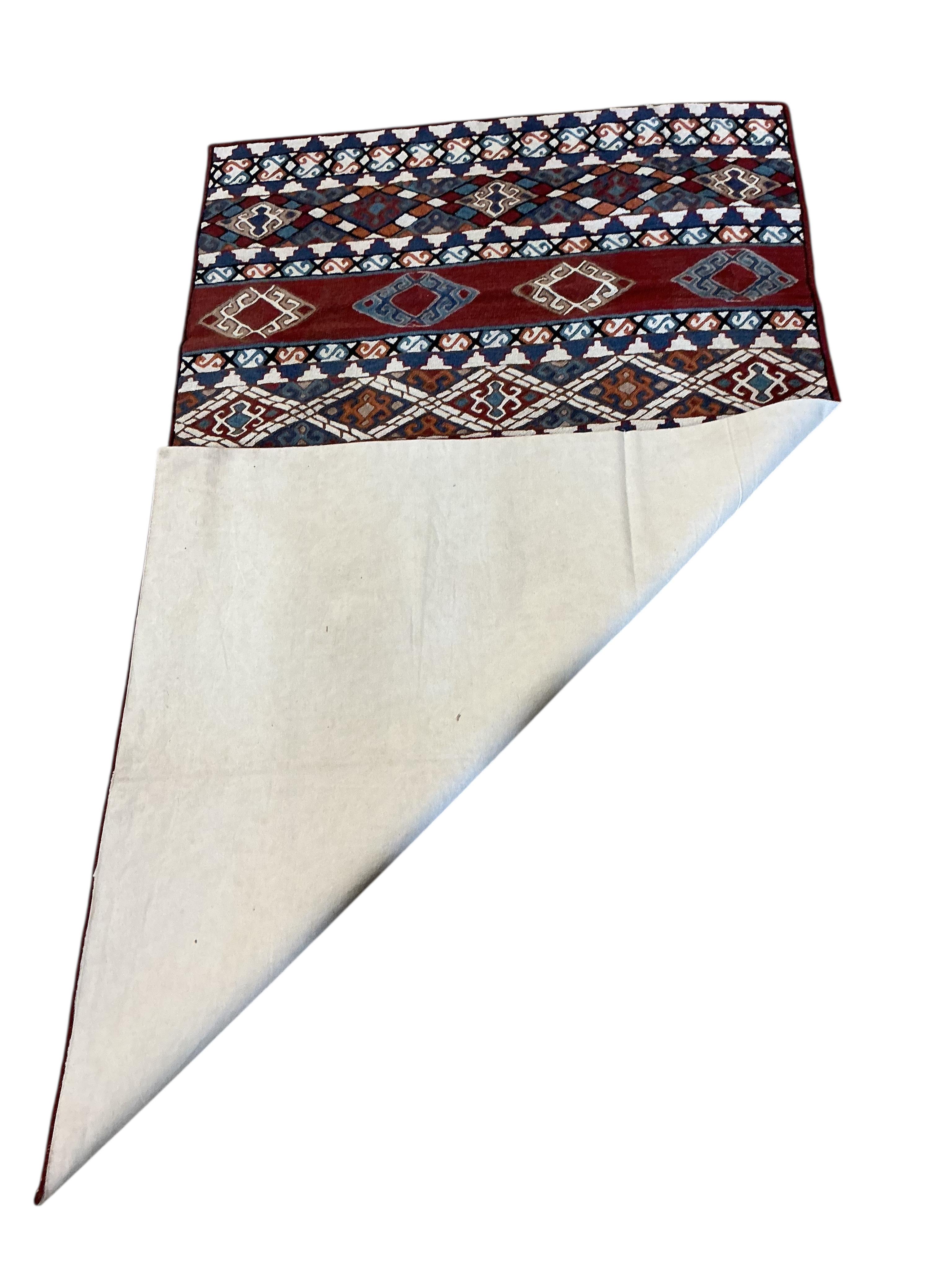 An Afghan red ground rug, a Kilim rug and a Caucasian rug, largest approx. 200 x 110cm